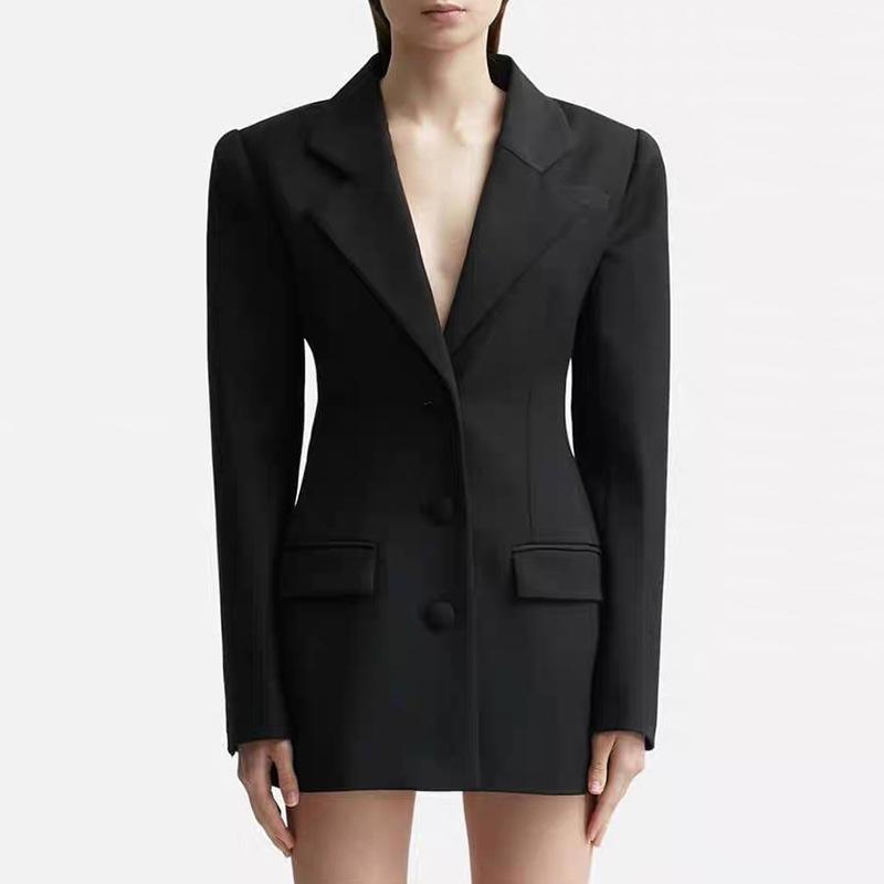 Women's suits with cut-out back and diamonds